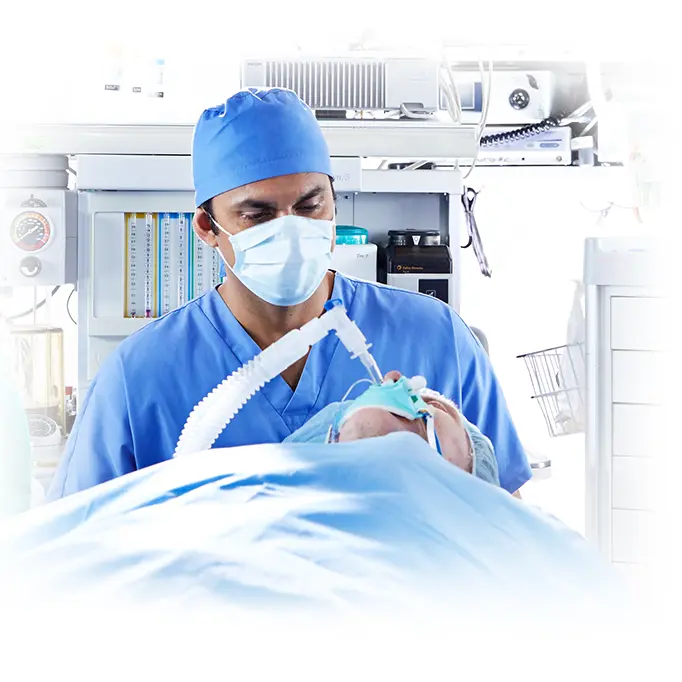 Anaesthesiologist using ICU medical equipment